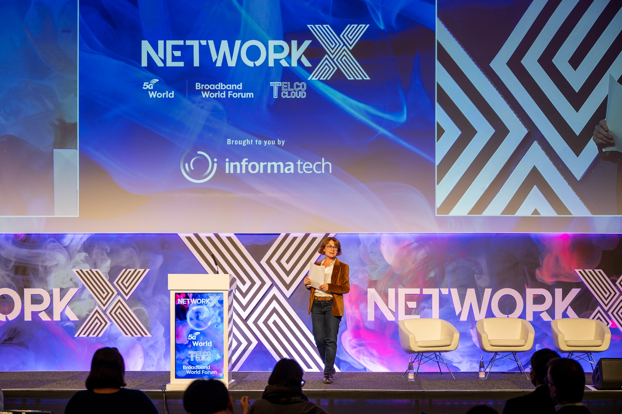 Speaker on stage at NetworkX