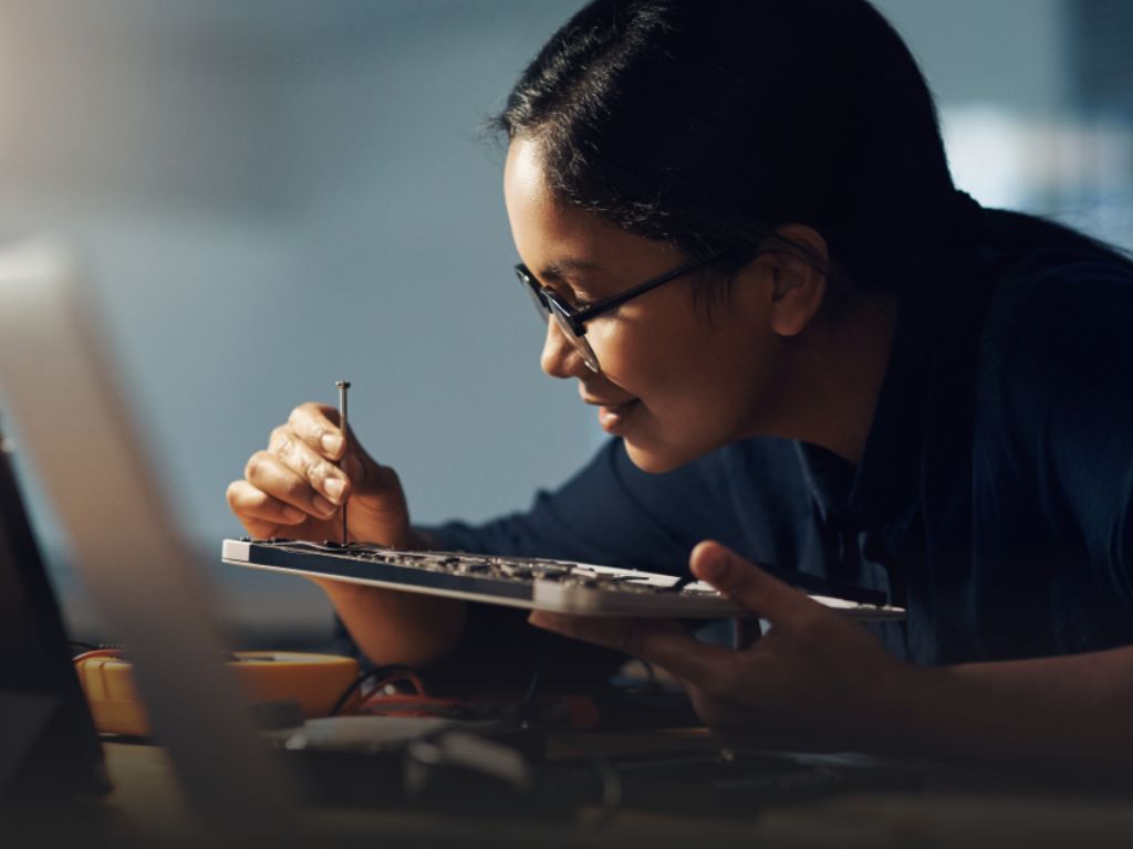 Female technician at work on a tablet